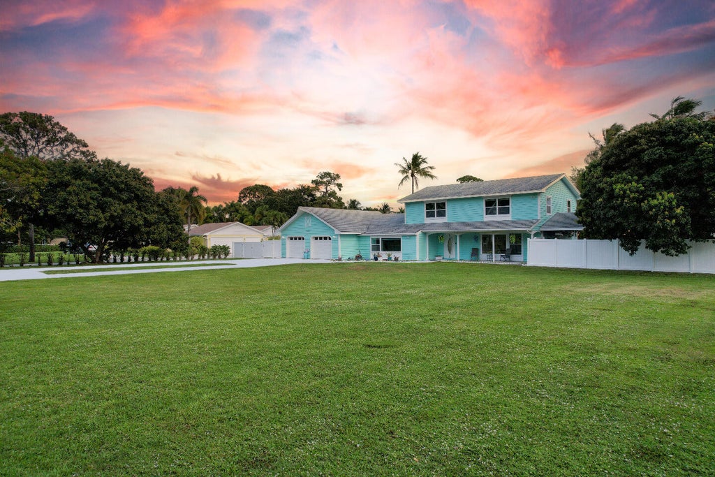 Photo of 5078 CANAL Drive, Lake Worth, FL 33463 (MLS # B26069149)