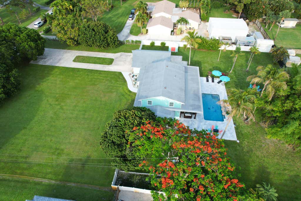 Photo of 5078 CANAL Drive, Lake Worth, FL 33463 (MLS # B26069149)