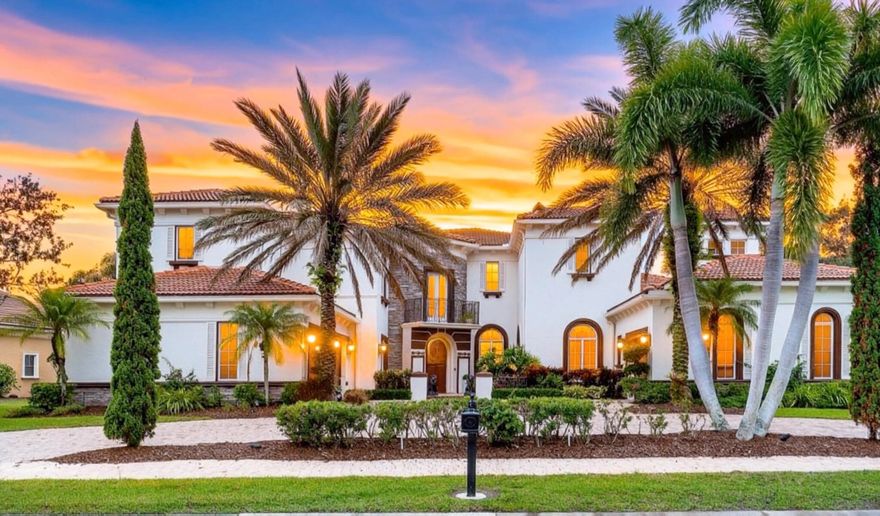 With views of Tesoro's 11th Golf Hole, this lakefront estate home boasts 26 ft. high ceilings & fireplace, a wall of windows stretching up 2 floors, a floating circular staircase, & screened porch with a 2nd-floor patio overlooking the pool & cabana bath. The kitchen is equipped with Viking appliances & breakfast bar adjoining the family room. The living, dining, & wet bar are prime entertainment areas. The Office has two story high bookcases & coffered ceilings. The primary retreat boasts a tray ceiling & double closets with custom cabinetry. The primary bath includes 2 water closets, 2 vanities, & a whirlpool tub with window lined copula. The 1st Guest Suite has a courtyard entry & ensuite bath. Guest suites 2 & 3 are upstairs & feature a private den. Club membership is not required.