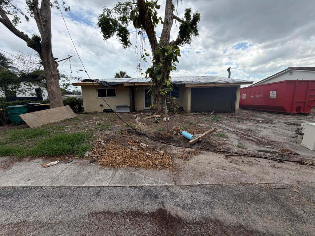 Photo of 835 NW 13th Avenue, Dania Beach, FL 33004 (MLS # B26039417)