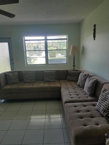 Furnished - Remodeled Condo , beautiful new kitchen, tiles throughout in a 55+ community with numerous amenities including free transportation, club house,Shuffleboard, picnic area, library, pools, theater, fitness center and much more! you will always be busy in this guarded community