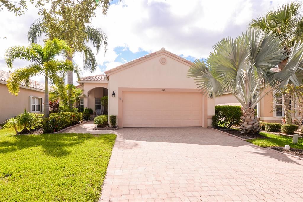 Photo of 315 NW Breezy Point Loop, Port Saint Lucie, FL 34986 (MLS # R10749029)