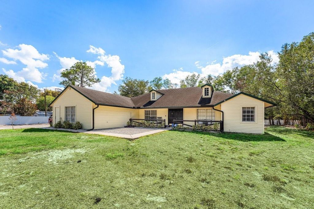 Photo of 16058 E Alan Black Boulevard, Loxahatchee, FL 33470 (MLS # F10554291)