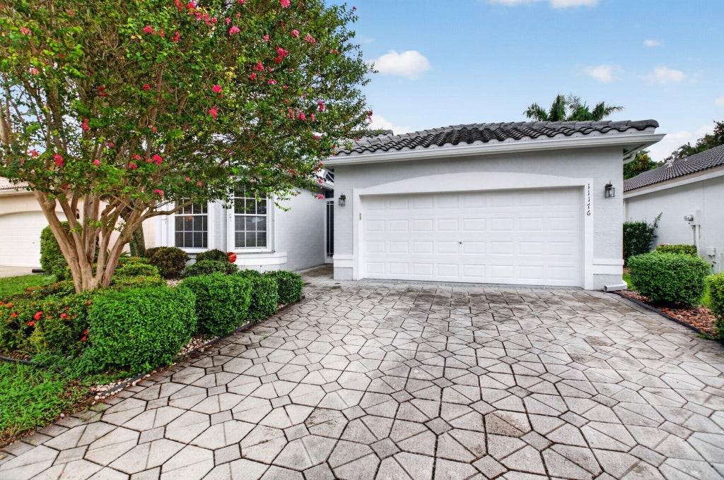 Photo of 11176 Ihilani Way, Boynton Beach, FL 33437 (MLS # B26075365)