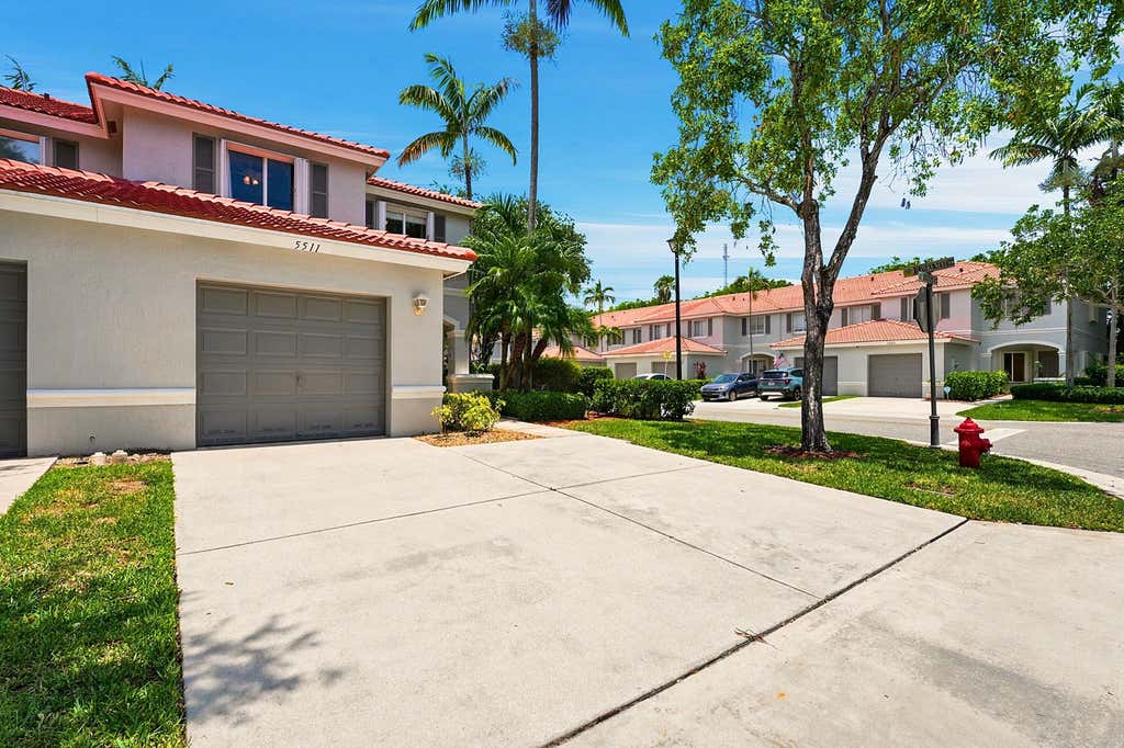 Photo of 5511 Crossing Rocks Court, Riviera Beach, FL 33407 (MLS # B26045911)