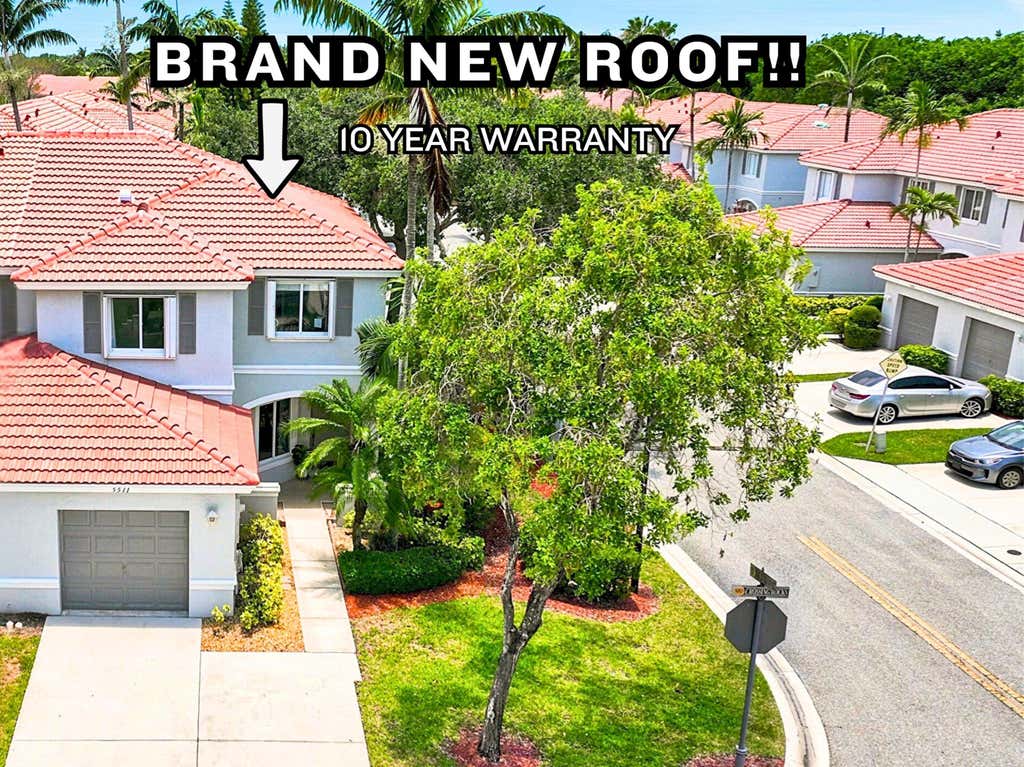 Photo of 5511 Crossing Rocks Court, Riviera Beach, FL 33407 (MLS # B26045911)