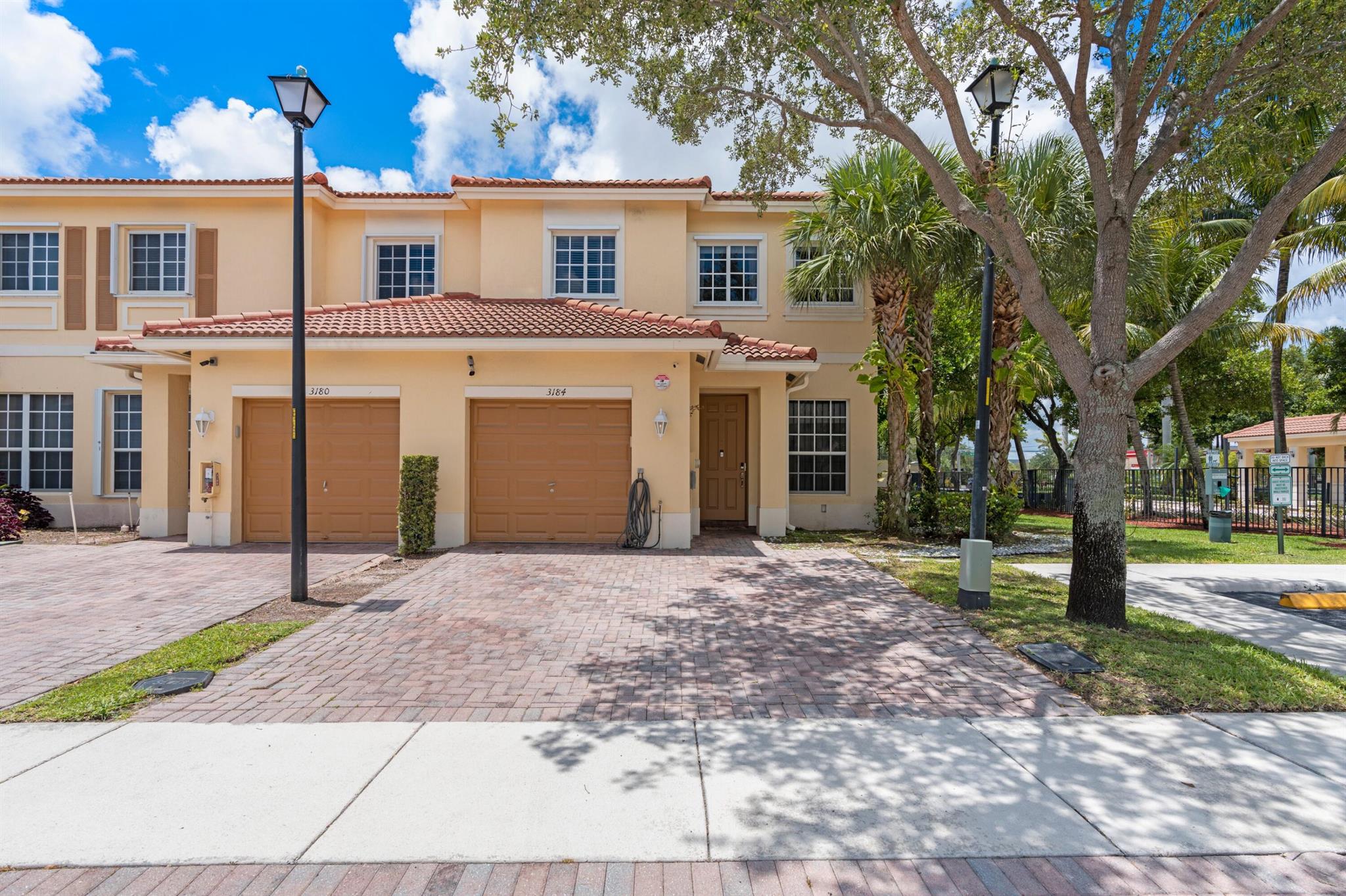 Beautiful and spacious corner home in the quiet gated community of Isles at Oakland Park. This rarely available corner townhome offers peace of mind and privacy with no rear or side neighbor. Home features include a spacious layout with open kitchen, stainless steel appliances, guest bathroom, tankless water heater, security system, 2 car driveway and a garage that is partially converted offering additional living or storage space. Upstairs offers 3 spacious bedrooms and primary suite complete with 2 walk-in closets and dual sink vanity. Additional walk-in closets throughout this home has plenty of storage. This quaint community features a swimming pool, low HOA fee, and convenient location near shopping, dining, highways and more!