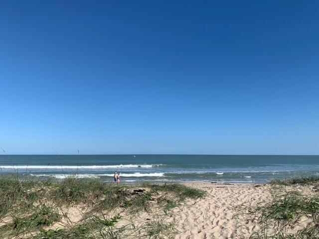 Location! Location! Location!The beach lifestyle awaits! Enjoy just a short walk through sandy, tropical trails to the beach. This cozy 1 bedroom, 1 bathroom boasts granite countertops, and tile throughout. Do not miss out on this chance to live in paradise!