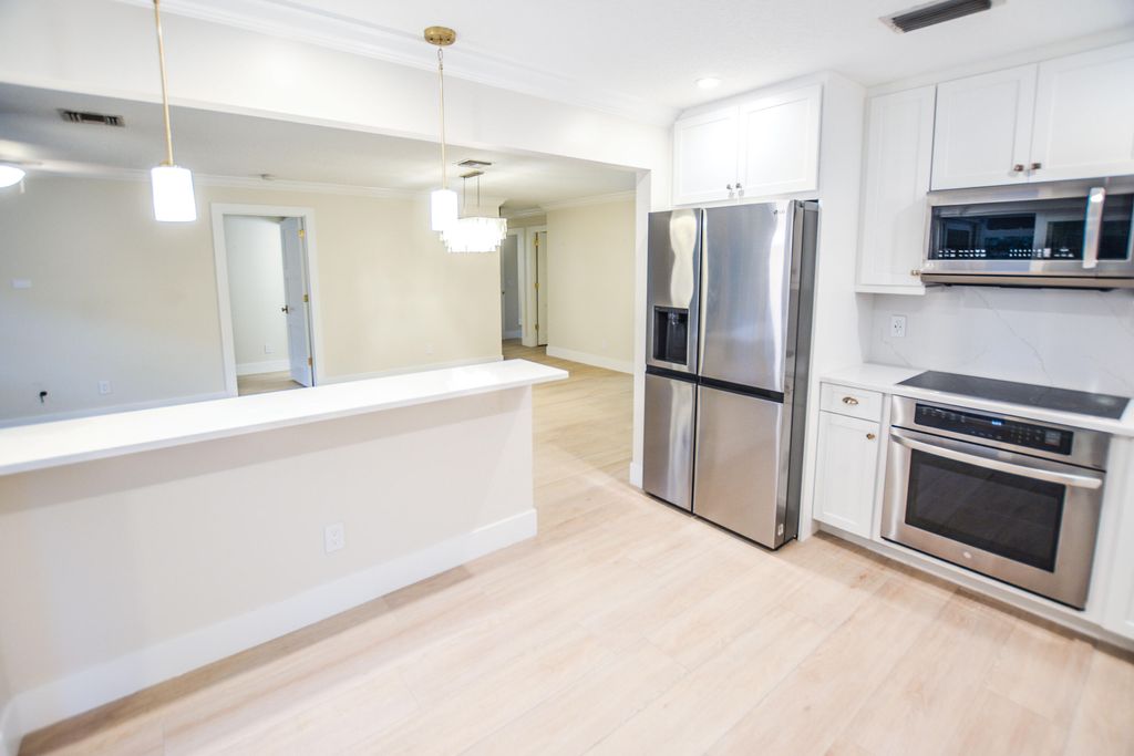 Photo of 226 Moccasin Trail W, Jupiter, FL 33458 (MLS # R11163532)