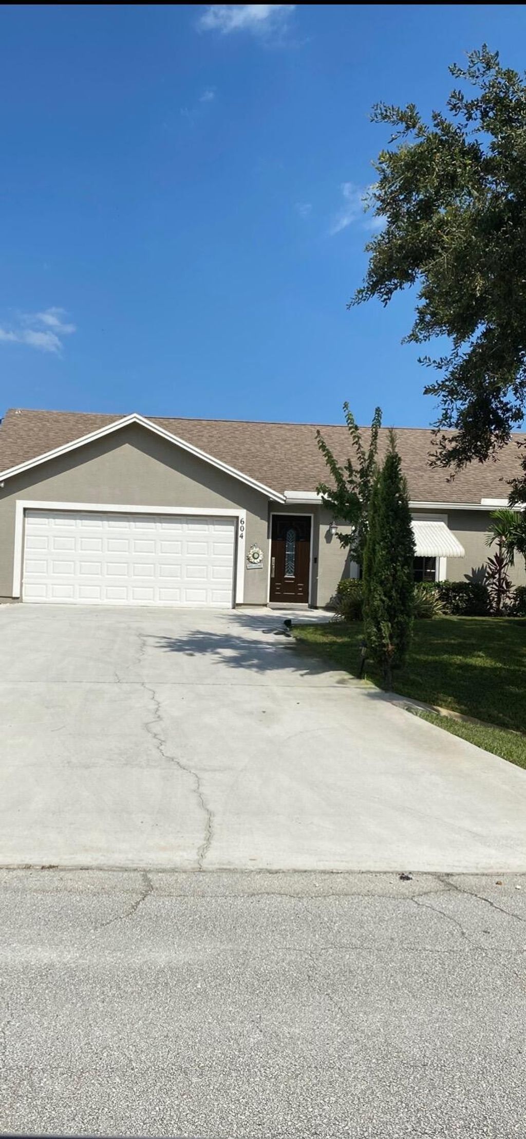 Photo of 604 SW Columbus Drive, Port Saint Lucie, FL 34953 (MLS # B26013331)