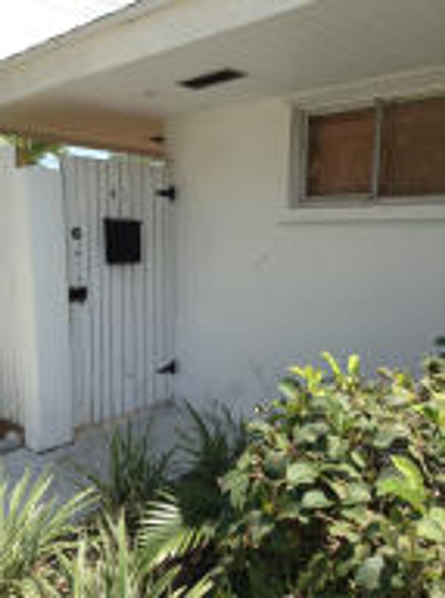 Very clean 2/1.5 well maintained condo villa for rent. Private patio decorated with bamboo fencing and colorful tropical garden. Master bedroom has modest size California closets and flat screen mount ready for use. Bathrooms have custom cabinets and Pottery Barn fixtures.  The walk in closet has plenty of closet space including a bicycle rack. Brand new park across the street, bicycle lanes, and community pool nearby. Close to PBI Airport, Mall, Movie theatre, Publix, DMV, Post Office, Police, Fire, MD Now & Palms West Hospital.  Rent includes basic cable, pest control, gardening, assigned covered parking space and key to community pool.  SORRY...no pets of any kind! Landlord requires 3 reference letters and renter's insurance.