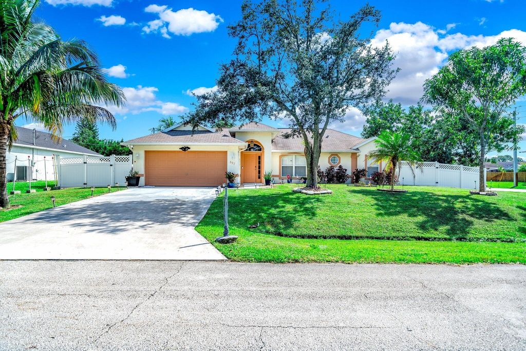 Photo of 897 SW Curry Street, Port St Lucie, FL 34983 (MLS # R10928085)
