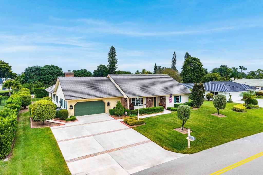 Photo of 420 Muirfield Drive, Atlantis, FL 33462 (MLS # R11154878)