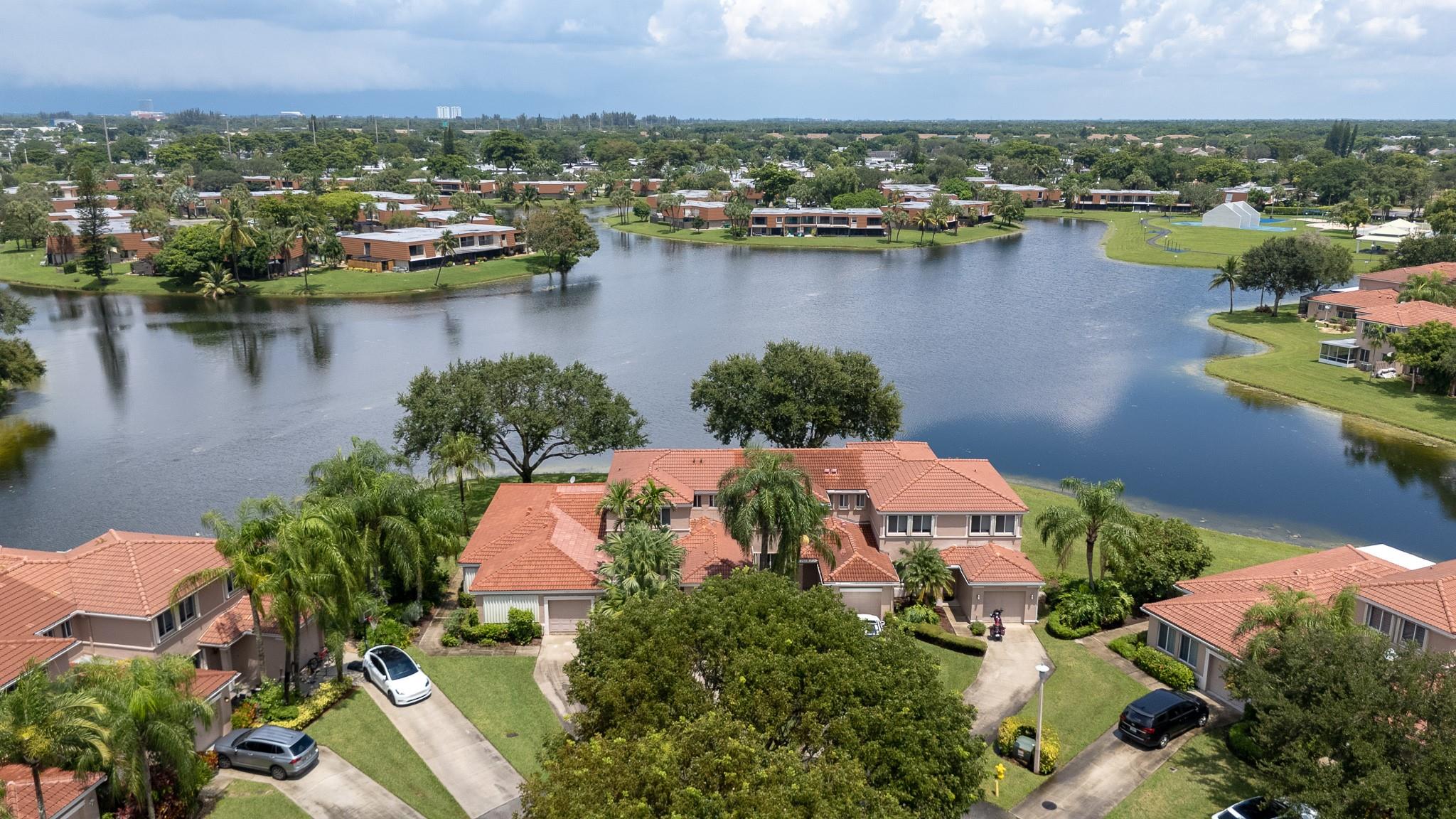 Welcome to Harmony Lakes! This updated 2 story, 3 bedroom, 2½ bath townhome is centrally located in Davie. Townhome features an eat-in kitchen, tile & laminate flooring, screened-in waterfront patio with oversized sliders, 1 car garage, washer & dryer, extra storage, modern touches throughout the home. The community, which is in a great school district, features a pool, park, tennis & basketball courts, and picnic gazebo. Easy access to 95, 75, turnpike, Sawgrass Mills, and minutes from area universities.