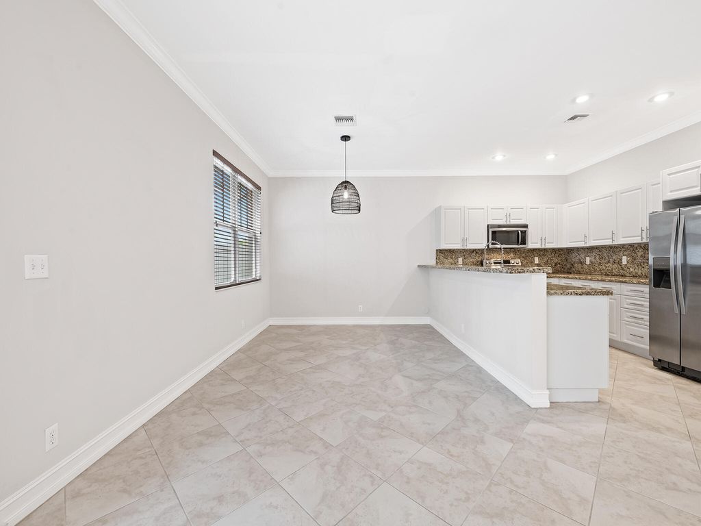 Photo of 3434 NE 13th Avenue, Oakland Park, FL 33334 (MLS # B26004725)