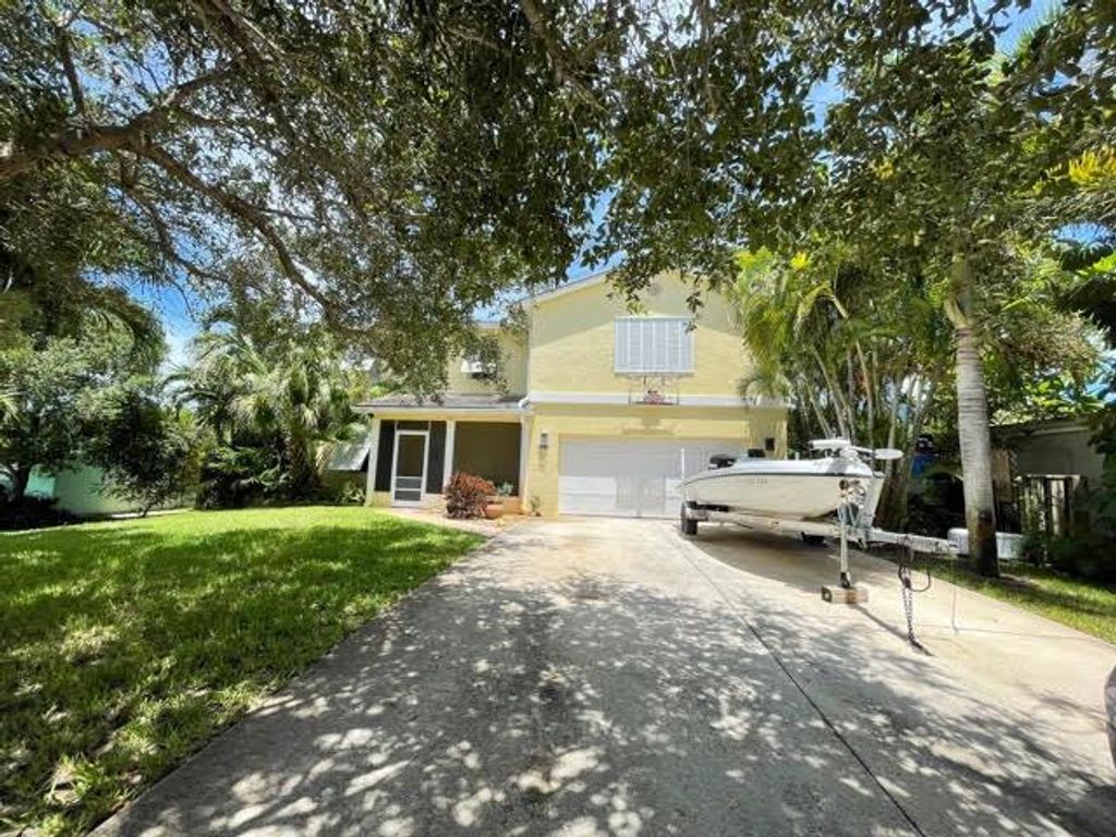 Photo of 2408 Tamarind Drive, Hutchinson Island, FL 34949 (MLS # R10737042)