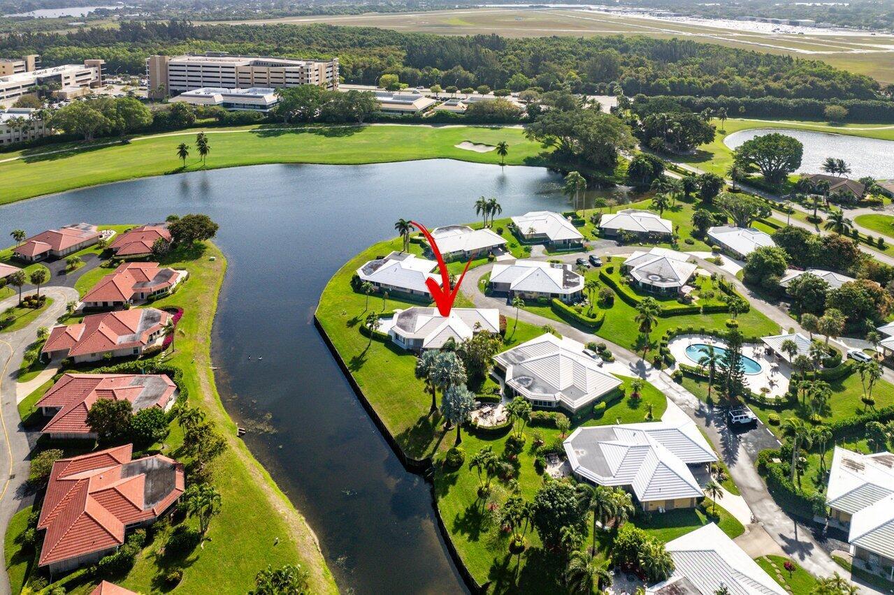 Waterfront Gem with Unmatched Golf & Lake Views!Discover the perfect blend of serenity and scenic beauty in the sought-after Yorktowne subdivision of Atlantis! This charming 2-bedroom, 2-bathroom + den free-standing villa offers breathtaking lake and golf vistas from the moment you step inside. Designed for those who appreciate outdoor living, the home features an expansive circular patio deck, perfectly hedged for privacy while preserving the stunning views beyond.