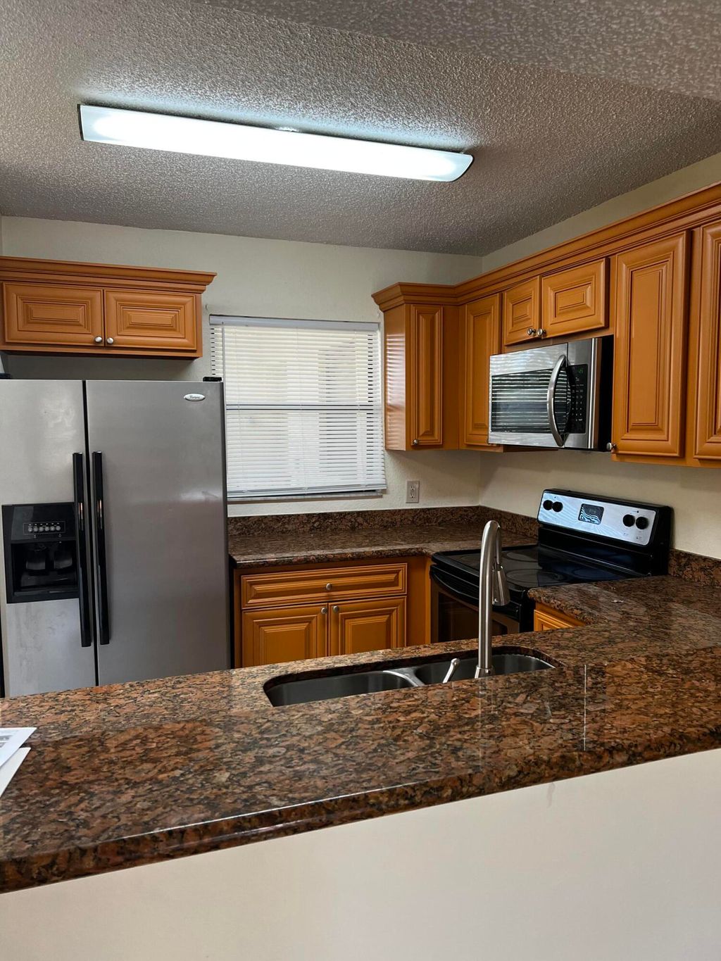 Photo of 1541 Balfour Point Drive #F, West Palm Beach, FL 33411 (MLS # B26026430)