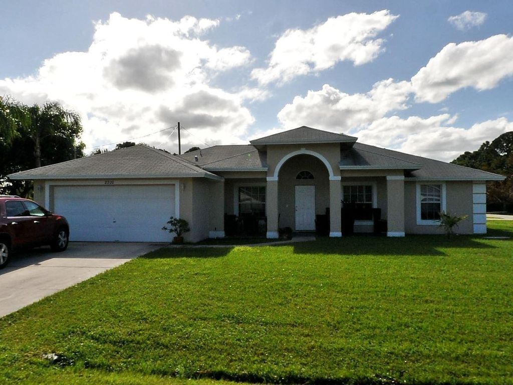 Photo of 2220 SE Baron Street, Port St Lucie, FL 34952 (MLS # R10936064)