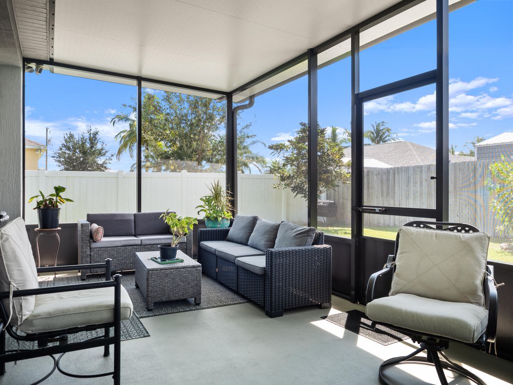 Photo of 6458 NW Flair Street, Port St Lucie, FL 34986 (MLS # R10918525)