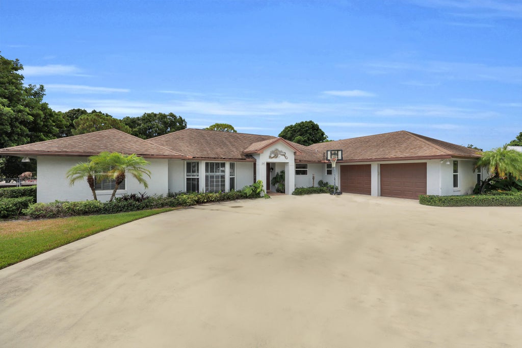Photo of 64 SE Turtle Creek Drive, Tequesta, FL 33469 (MLS # B26069096)