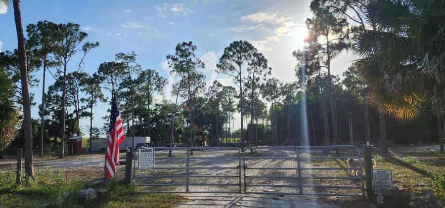 CURRENTY AGRICULTURE EXEMPT 5.38 ACRES AT A QUIET DEAD END STREET SITUATED NEXT TO A PRESERVE AREA THAT WILL NEVER BE BUILT ON. PROPERTY IS SET UP TO HAVE HORSES  OR A NICE SHOP WITH A CURRENT HOUSE PAD SITUATED OFF  TO ONE SIDE. HOUSE PAD WILL PASS A DENSITY TEST WITH FLYING COLORS BEING MADE OF SHELLROCK  DIRT AND COMPACTED. THIS AGRICULTURE RESIDENTIAL PROPERTY BOAST THE ABILIITY  TO HAVE ALL YOUR TOYS  AND ANIMALS WITH THE ABILITY TO BUILD YOUR OWN SHOOTING RANGE, IF THAT IS YOUR STYLE.  PROPERTY HAS A 120 FT WELL DRILLED WITH GREAT WATER QUALITY AND HAS 2 POWER HOOKUPS FOR HORSE TRAILER TO PLUG IN.. 2 STALL BARN WITH A FEED ROOMSS READY FOR YOUR ANIMALS OR STORAGE.  COME AND BUILD YOUR DREAM WITH THIS READY TO BUILD PROPERTY.