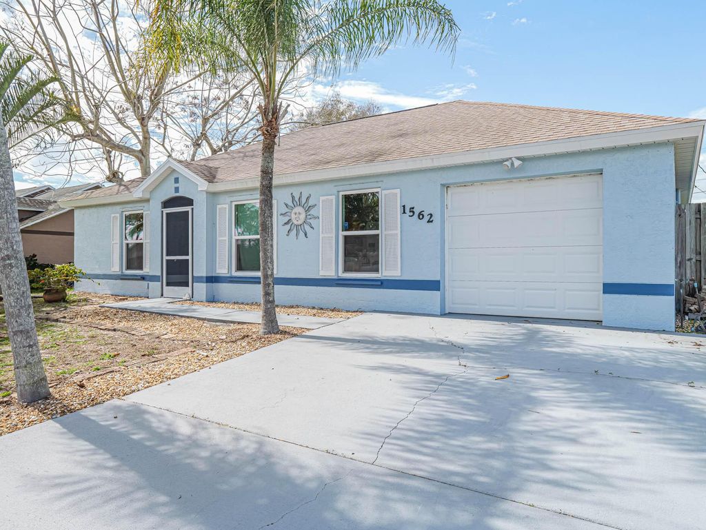 Photo of 1562 SE Crowberry Drive, Port Saint Lucie, FL 34983 (MLS # R10959577)