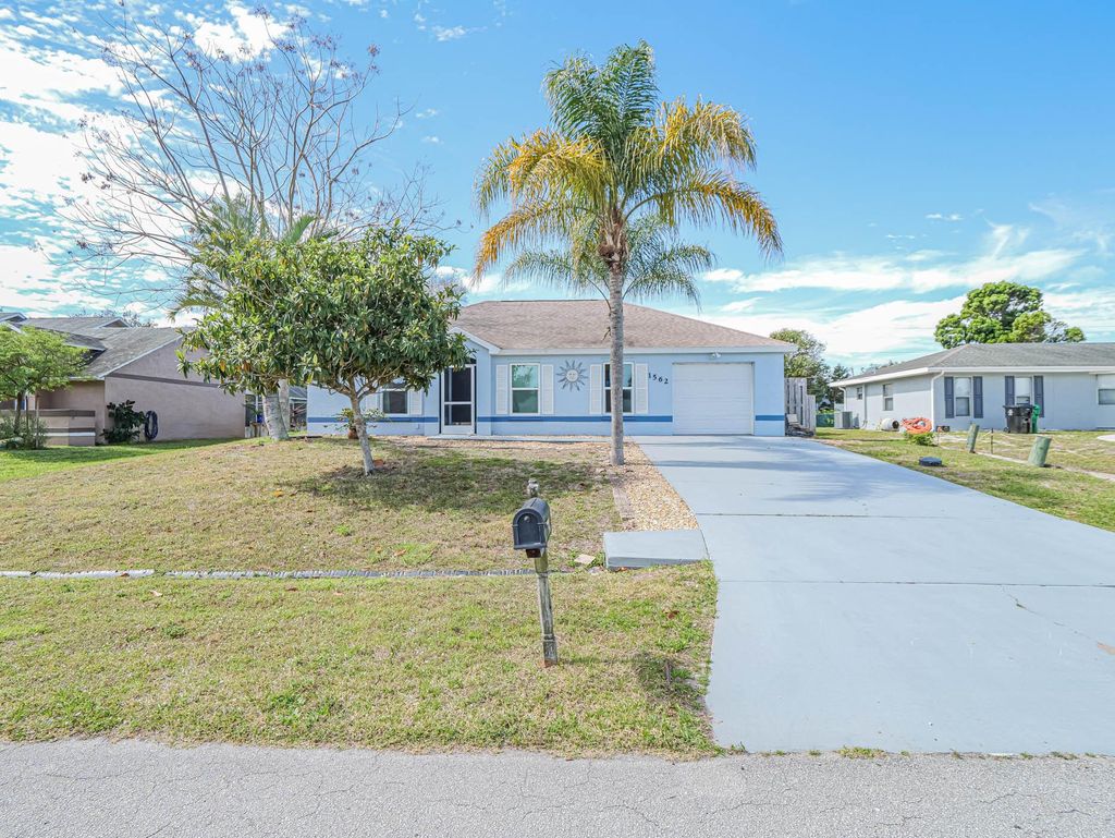 Photo of 1562 SE Crowberry Drive, Port Saint Lucie, FL 34983 (MLS # R10959577)