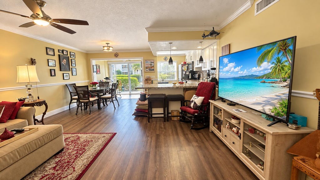 Photo of 14 COLONIAL CLUB Drive #103, Boynton Beach, FL 33435 (MLS # B26074106)