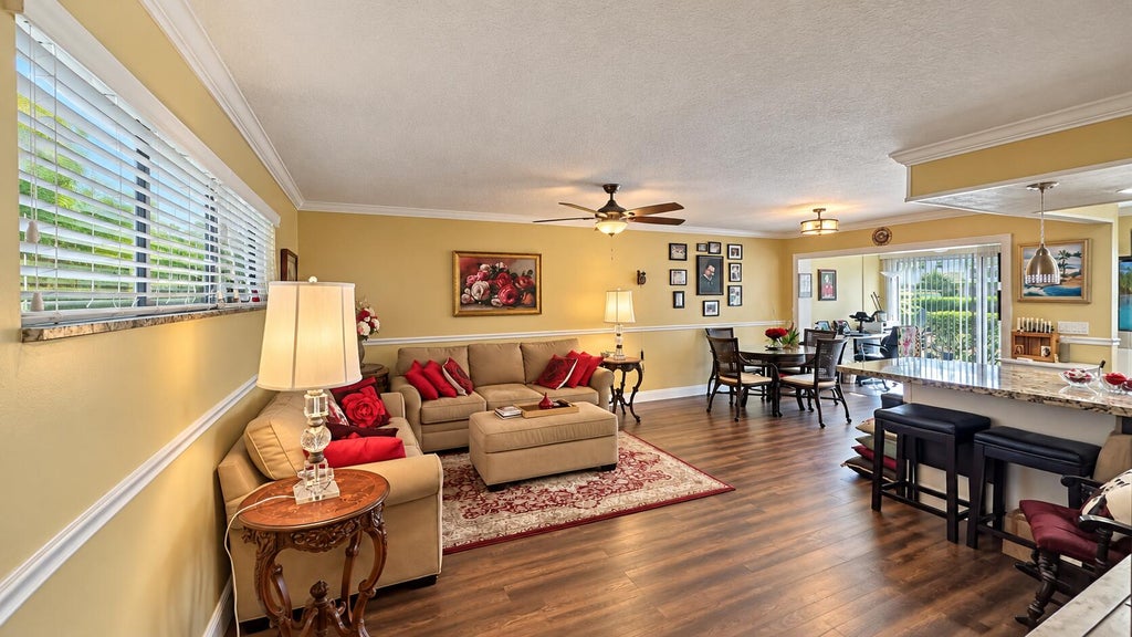Photo of 14 COLONIAL CLUB Drive #103, Boynton Beach, FL 33435 (MLS # B26074106)