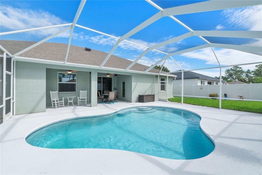 Photo of 2390 SW Salmon Road, Port Saint Lucie, FL 34953 (MLS # F10536247)