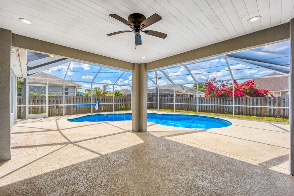 Photo of 2544 SW Deckard Street, Port Saint Lucie, FL 34953 (MLS # B26008143)