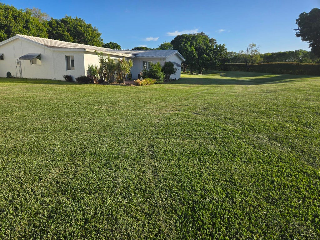 Photo of 1291 NW 90TH Way, Plantation, FL 33322 (MLS # B26054410)