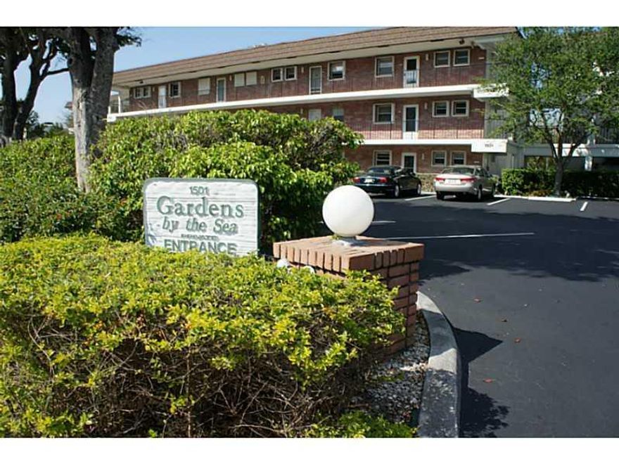 Excellently Maintained Apt. for Owner's Living or as a Nice Rental Investment Located Right Across from the Beach/A1A; Screened Patio Overlooking a Courtyard/Garden View; New Heavy Duty Roof 2013; Very Desirable Complex with Outdoor Barbecue Area; LOW HOA ; Does NOT Get Any Better for the Price!