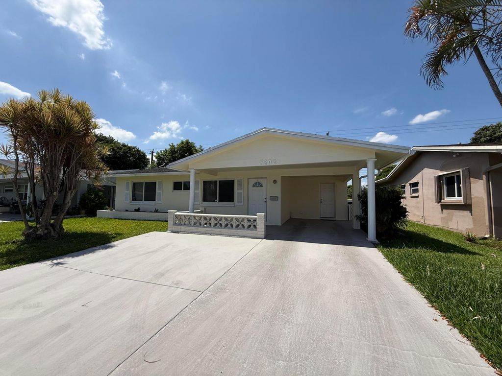 Photo of 7302 NW 57th Court, Tamarac, FL 33321 (MLS # B26019649)