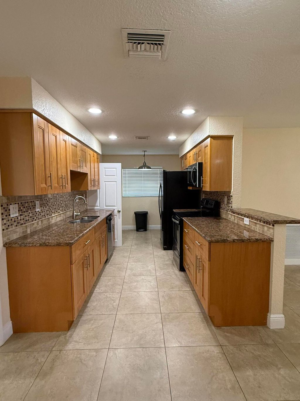 Photo of 7302 NW 57th Court, Tamarac, FL 33321 (MLS # B26019649)