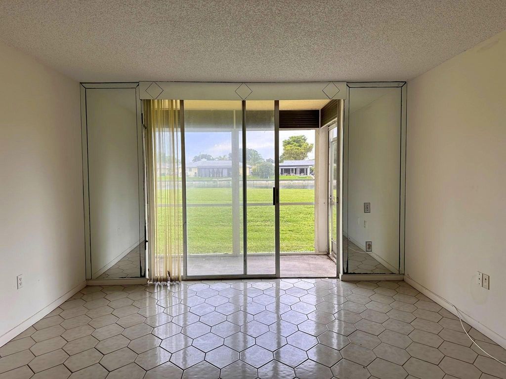 Photo of 9090 Lime Bay Boulevard #106, Tamarac, FL 33321 (MLS # B26009160)
