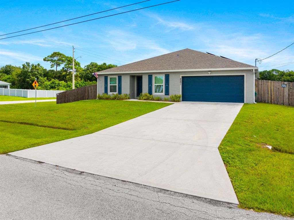 Photo of 4201 SW Utterback Street, Port Saint Lucie, FL 34953 (MLS # R11011933)