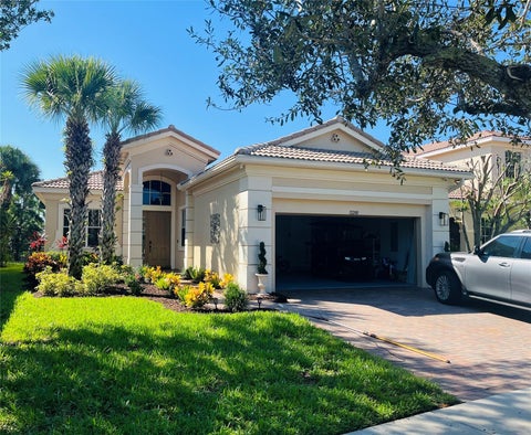 Photo of 12200 NW 77TH Manor, Parkland, FL 33076 (MLS # B26070158)