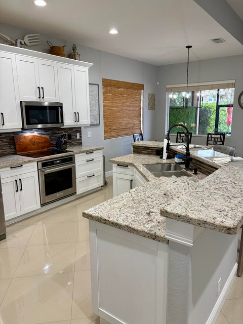 Tiny photo for 12200 NW 77TH Manor, Parkland, FL 33076 (MLS # B26070158)