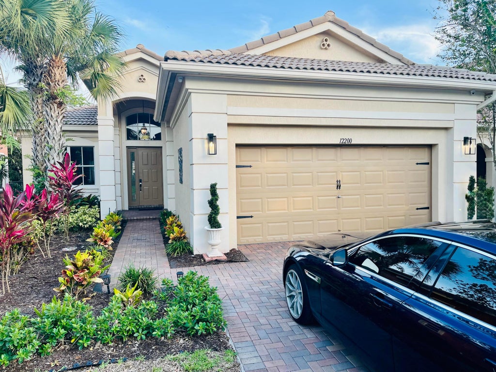 Photo of 12200 NW 77TH Manor, Parkland, FL 33076 (MLS # B26070158)
