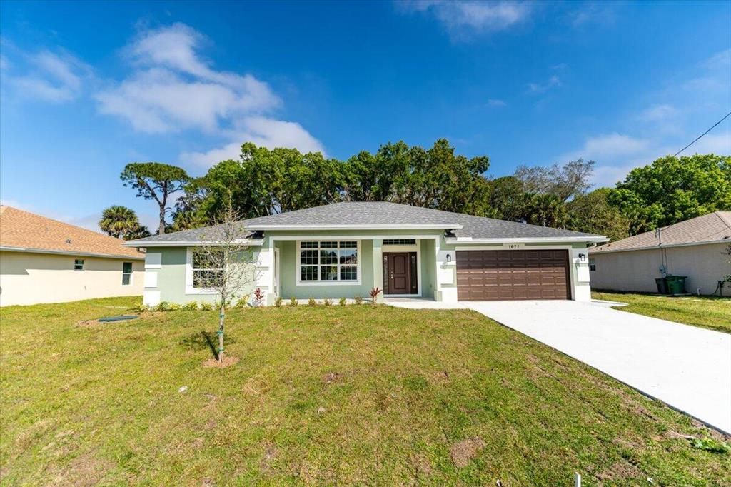 Photo of 1671 SW Lexington Drive Dr, Port St Lucie, FL 34953 (MLS # R10775542)