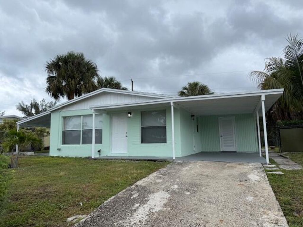 Photo of 1511 W 12th Street, Riviera Beach, FL 33404 (MLS # B26020572)