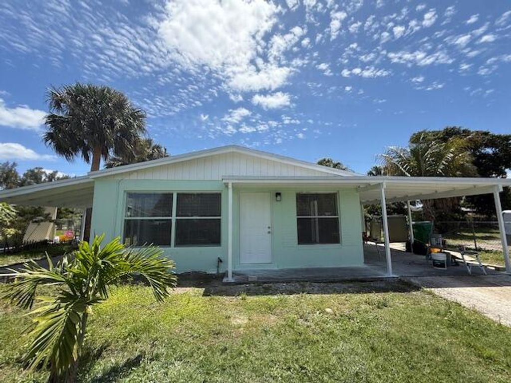 Photo of 1511 W 12th Street, Riviera Beach, FL 33404 (MLS # B26020572)