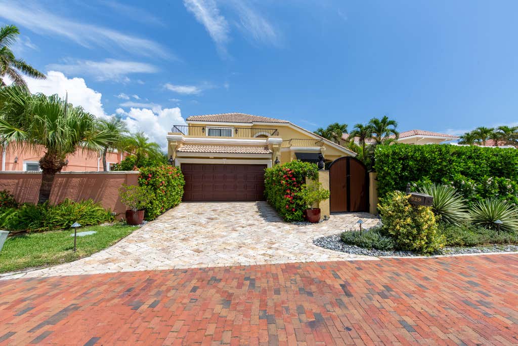 Photo of 529 Pelican Way, Delray Beach, FL 33483 (MLS # B26044447)
