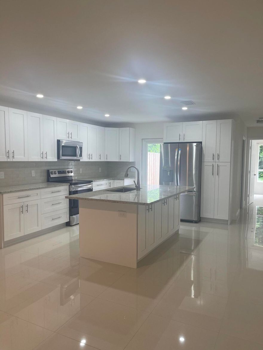 Fully remodeled 4-bedroom, 2-bath home in Boca Raton with NO HOA! Renovated less than 2 years ago featuring modern finishes, updated kitchen and baths, and a bright open layout. The property is currently tenant occupied generating $3,000 per month with lease in place until June 30, 2026. Excellent opportunity for investors seeking immediate rental income or for buyers planning to occupy after the lease expires. Conveniently located near schools, shopping, restaurants and major highways. Seller motivated and open to offers.