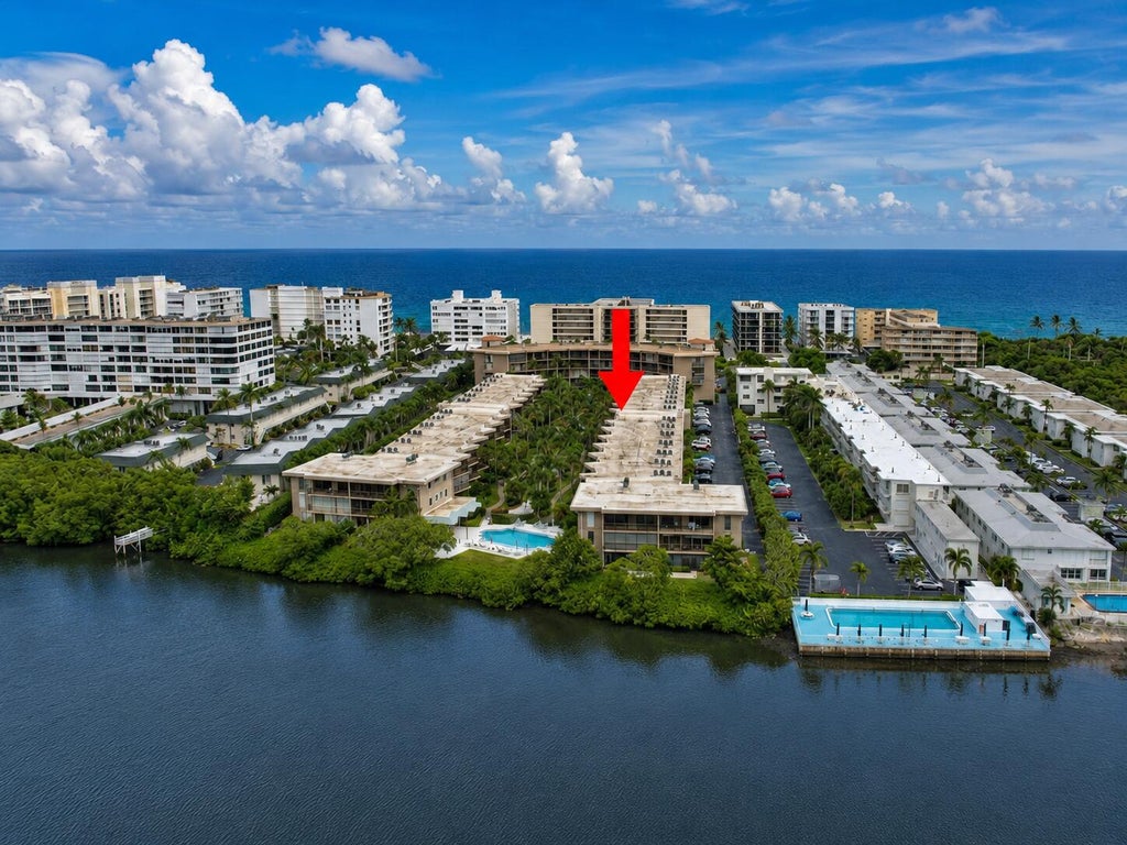 Photo of 3605 S OCEAN Boulevard #123, South Palm Beach, FL 33480 (MLS # B26069715)