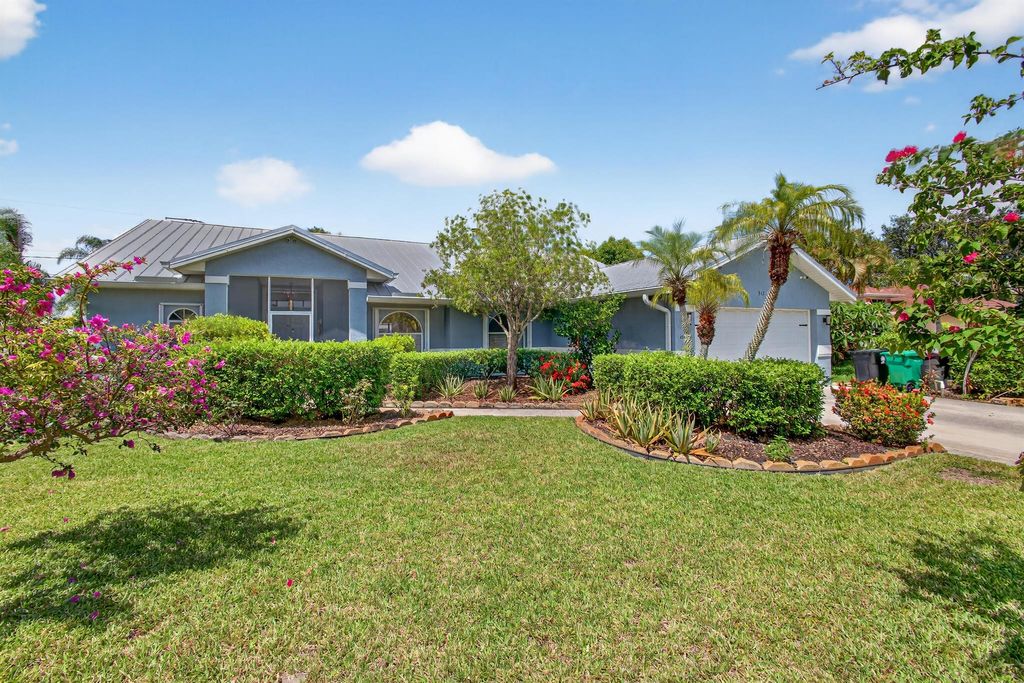 Photo of 511 SE Berry Avenue, Port Saint Lucie, FL 34984 (MLS # R11102234)
