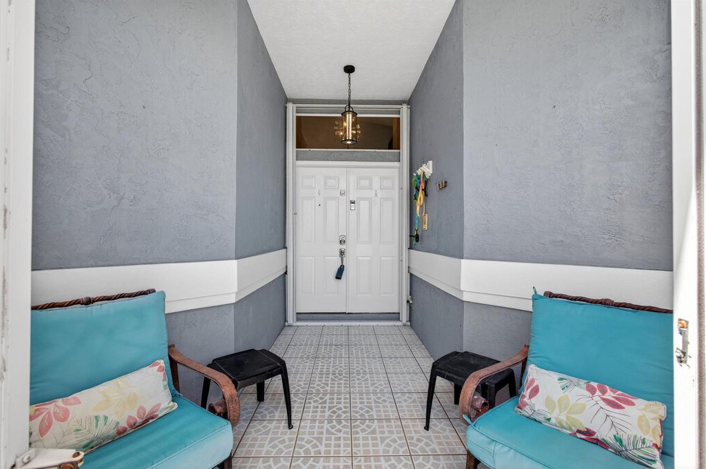 Photo of 511 SE Berry Avenue, Port Saint Lucie, FL 34984 (MLS # R11102234)