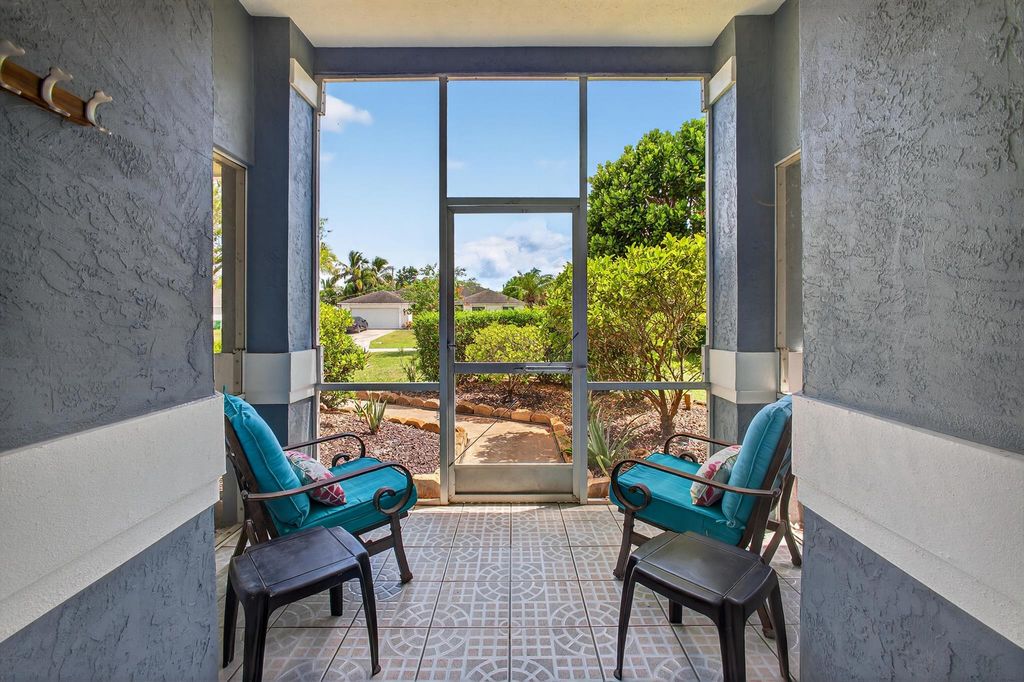 Photo of 511 SE Berry Avenue, Port Saint Lucie, FL 34984 (MLS # R11102234)